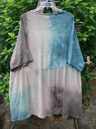 Barclay Art Tee Fern Garden Mottled Pure Dawn OSFA, showcasing a tunic-length design with drop shoulders and loose three-quarter sleeves, displayed outdoors, embodying BlueFishFinder's vintage, creative fashion spirit.