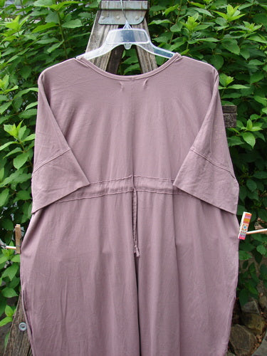 Barclay Long Tee Tie Back Dress Star & Moon Mottled Dark Mauve OSFA displayed on a clothes rack, highlighting its rounded neckline, seamless bodice, and drawcord back, embodying Bluefishfinder's vintage creative style.