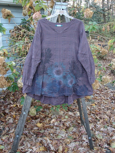 Barclay Draw Back Sectional Pullover Tunic Forest Garden Wine Stripe Size 2, featuring a lightweight short-sleeved design with a floral pattern, displayed on a wooden rack.