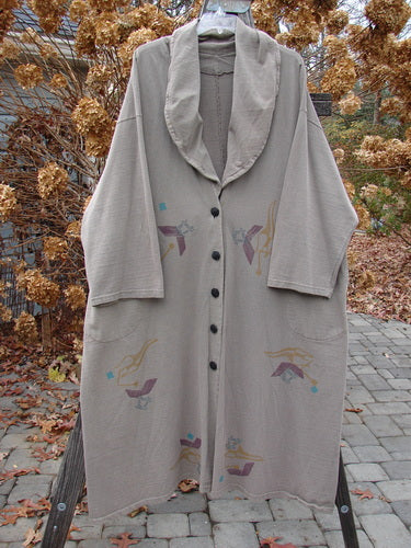 1994 Reprocessed Carriage Coat Ric Rack Raku OSFA featuring a wide billowy collar, oversized vintage buttons, deep side pockets, and a varying hemline, showcasing signature Blue Fish patch and ric rack theme paint.