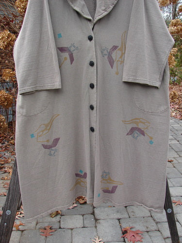 1994 Reprocessed Carriage Coat Ric Rack Raku OSFA featuring oversized vintage buttons, deep side pockets, and a billowy collar, showcasing Blue Fish's signature patch and ric rack design.