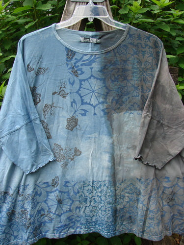 Barclay Dolman Curl Edge Square Pullover Victorian Mandela Mottled Sky Gray OSFA displayed on a hanger, showcasing its seamless design, rounded ribbed neckline, and curly arm edgings, reflecting Bluefishfinder.com's vintage style.