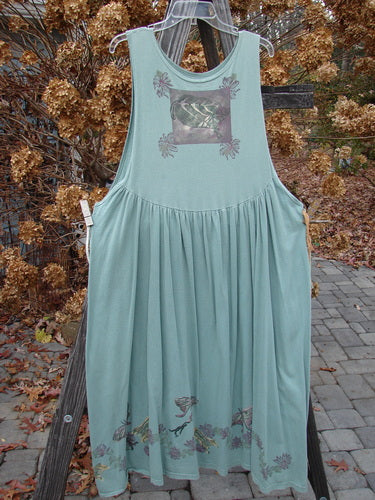 1994 Side Button Jumper Butterfly Garden River Size 1: Mid-weight cotton dress with a rounded neckline, deeper arm openings, and butterfly garden theme. Missing front apron, with side buttons for attachment.