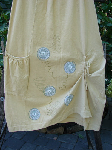 2000 Side Pocket Skirt Pinwheel Plantain Size 0, featuring a full elastic waistline, sectional vertical panels, and a unique pinwheel design, made from organic cotton.