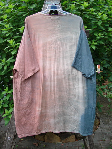 Barclay Art Tee Bicycle Floral Basket Mottled Mauve Gray OSFA displayed on a mannequin, highlighting its loose three-quarter sleeves, rounded neckline, and upward rounded front hem, crafted from organic cotton.