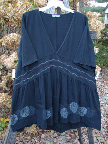 Barclay Deep V Banded Waist Tunic Dress Coral Black Size 2 displayed on a hanger, showcasing its V-shaped neckline, flaring lower, and scallop hemline with a coral sea life theme.