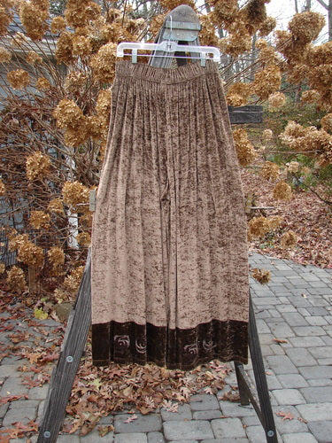 Image alt text: 1997 Velvet Sanskrit Cosmos Duo Mandorla OSFA Size 2 - Brown skirt on a rack and brown curtain with a brown pattern.