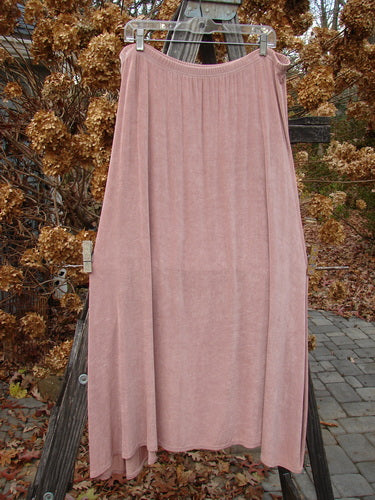 1999 Acetate Lycra Camillia Acetate Duo Swan Size 1 2 displayed on a clothes rack, featuring a swingy A-line shape and varying hemlines, showcasing the vintage Blue Fish Clothing aesthetic.