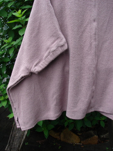 Barclay Celtic Moss Patched Poncho Single Flowerpot Mallow OSFA features open sides and gathered lower sleeves, showcasing a plush, dense-textured cotton fleece, ideal for versatile, cozy winter wear.