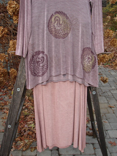 1999 Acetate Lycra Camillia Duo Swan Size 1 2 displayed on a wooden ladder, showcasing the swingy A-line shape and floral theme of the top with the coordinating skirt's elastic waist.