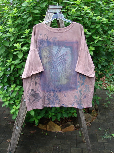 Barclay Center Seam Wide Line Tee Fern Fare Mottled Mauve OSFA, showcasing a boxy shape with a vertical center seam, drop shoulders, and a ribbed neckline, crafted from organic cotton.