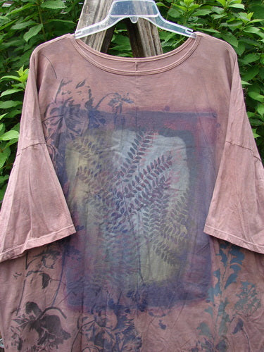 Barclay Center Seam Wide Line Tee Fern Fare Mottled Mauve OSFA featuring a close-up of its unique vertical center seam, rounded neckline, and boxy shape, crafted in organic cotton.