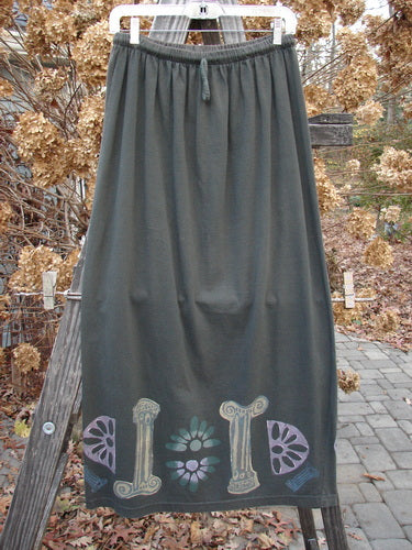 1993 Drawcord Skirt Column Black Sand Size 2, featuring a painted continuous column theme, flower detail, and full elastic rope waistline, showcased outdoors in perfect condition from Bluefishfinder.com.