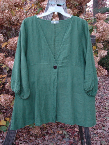 Barclay Linen Deep V Single Button Cardigan Unpainted Jade Size 2 displayed on a hanger, featuring a deep V neckline, single button closure, and billowy three-quarter sleeves with elastic edges.
