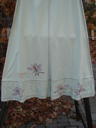 1998 Botanicals Sparrow Skirt Garden Bug Grasshopper Size 1, featuring butterfly patterns, full elastic waist, exterior stitchery, sectional panels, and a wide A-line flare in mid-weight organic cotton.