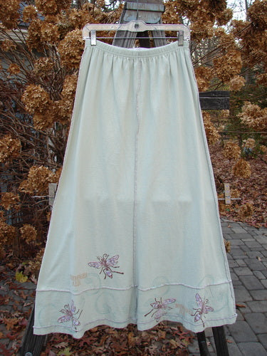 1998 Botanicals Sparrow Skirt Garden Bug Grasshopper Size 1: A white skirt with butterfly embroidery, full elastic waistline, vertical stitchery, and wide A-line flare. Made from mid-weight organic cotton.