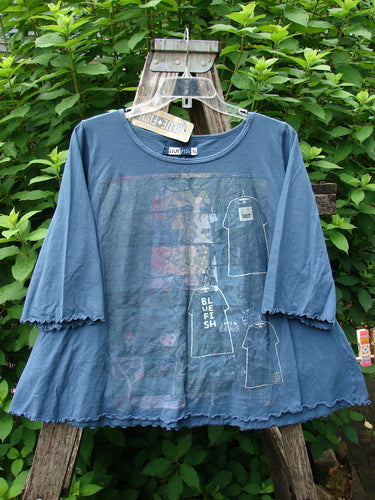 Barclay NWT Crop A Lined Cafe Tee Play Dress Up Echo Blue Size 0, displayed outdoors on a swing, showcasing its A-line shape, rounded neckline, and curly edgings, embodying Bluefishfinder.com's vintage style.
