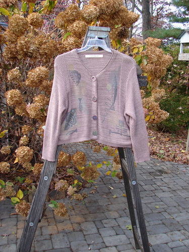 1995 Crop Cardigan Sweater with fish and space theme paint. Lovely blend of cotton and rayon. Original ceramic buttons. Cozy and long sleeves.