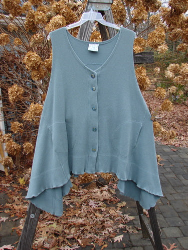 1992 Thermal Tunic Vest with deep V neckline and rounded pockets, made from vintage thick thermal fabric. OSFA size in unpainted grey green.