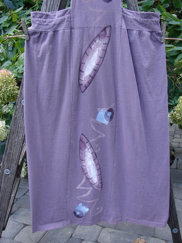 1996 Souvenir Jumper Turn Path Petunia Size OSFA featuring a full gathered skirt, criss-cross back, thick front straps, and a painted bib with abstract design.