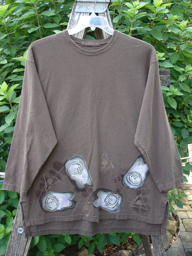 1998 Long Sleeved Vented Tee Tumble Stone Stick Size 1 features a painted design, drop shoulders, and a thicker rib neckline, showcasing vintage Blue Fish's creative expression and individuality.