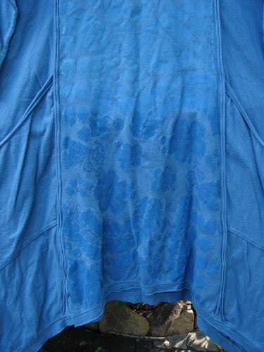Barclay NWT Wildflower Tunic Garden Blend Blue Bird Size 0 features a blue floral design with raw edges, flutter hemline, and drop front pockets, embodying BlueFishFinder's creative, vintage style.