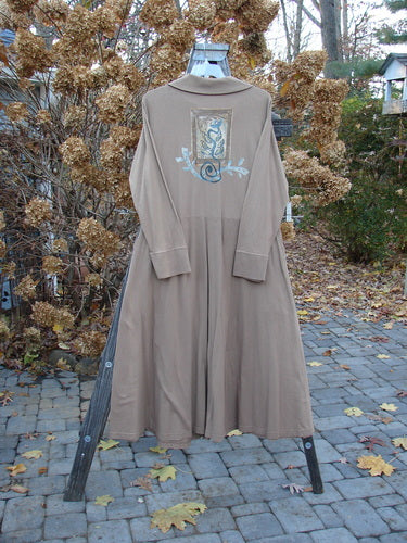 1995 Virginia Woolf Dress Home Butterfly Size 1: Long brown coat with ribbed accents, front snaps, and a sweeping hemline.