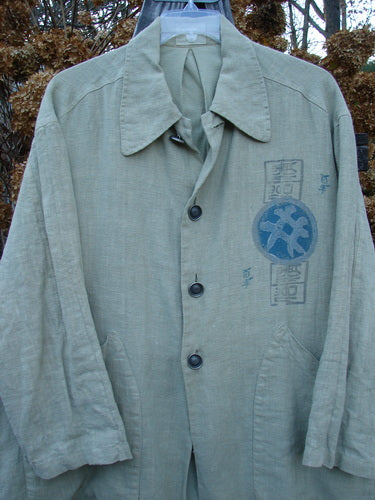 1999 Hemp Yard Coat Far East Cement Size 1: Heavyweight cotton hemp jacket with logo, soft flannel lining, metal buttons, adjustable side tabs, and front drop painted pockets.