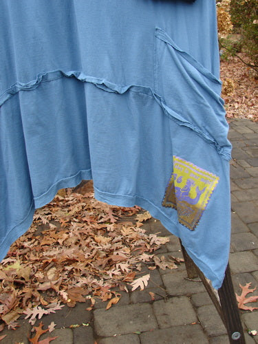 Barclay NWT Raw Seam Vector Dress Flower Power Whistler Blue Size 2 on display, featuring raw edges, a V-neckline, and a gathered front seam.