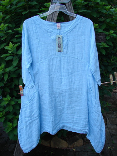 Barclay NWT Linen Cross Over Urchin Pocket Dress Unpainted Splash Size 1 features a smart crossover V-neckline, drop shoulders, downward curved empire waist, and double drop flop side pockets.