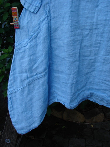 Barclay NWT Linen Cross Over Urchin Pocket Dress Unpainted Splash Size 1 features a smart V-neckline, drop shoulders, curved empire waist seam, and unique double drop flop side pockets in lightweight linen.