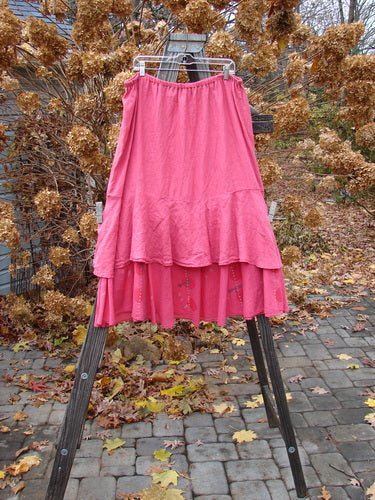 Barclay Linen Two Tier Ruffle Skirt Tiny Dragonfly Peony Size 2 hanging on a rack, showcasing its layered design and ruffled lower batiste.