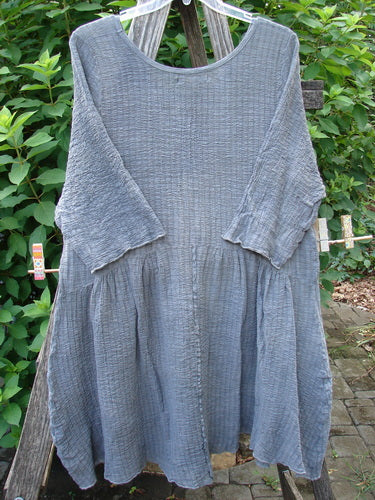 Barclay Crinkle Gauze Two Pocket Dolly Dress Mottled Slate Size 1 features a flouncy dual-pocketed skirt, downward curved empire waist, and exterior rolled seam, embodying BlueFishFinder's vintage elegance.