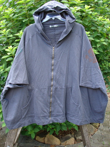 Barclay Hooded Postcard Zipper Jacket Vest Rear Home Raven OSFA, featuring a cozy hood, full zipper, roomy pockets, dolman shoulders, and a sweeping hemline, crafted from heavyweight organic cotton.