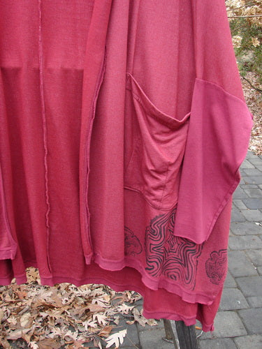 Barclay NWT Rayon Lycra Celebration Cardigan, featuring an open front, single lower exterior pocket, dolman three-quarter sleeves, and a spirograph design on the back.