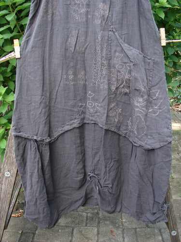 Close-up of the Barclay NWT Linen Explorer Jumper, showcasing its intricate contour garden design with a scoop neckline and billowy lower sweep, highlighting the medium-weight linen fabric and unique detailing.