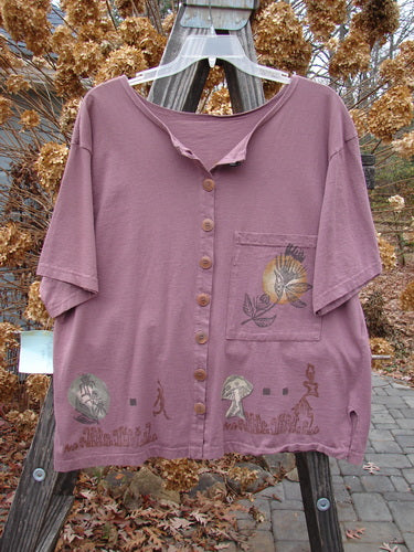 1994 NWT Camp Shirt Moon Flower Plum Size 1: A purple shirt with a pocket, Varying Hemline, and Moon Flower theme design.