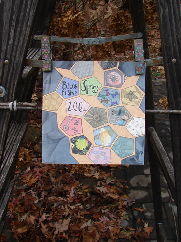 2001 Spring Catalog Sweet Keepsakes One Size displayed on a ladder, featuring intricate vintage drawings, poetry, and art themes, ideal for reminiscing or identifying pieces from the Blue Fish collection.
