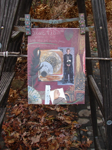 Image alt text: "1999 Fall Catalog: A close-up of a poster featuring a painting on a ladder, showcasing art and cultural inspiration from Blue Fish Clothing's vintage collection."