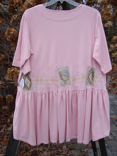 1999 NWT Garden Herb Dress Rooster Peony Size 1 on rack, showcasing drop waistline with four-paneled pockets, ceramic top button, flirty varying hemline, and detailed rooster-themed pattern.