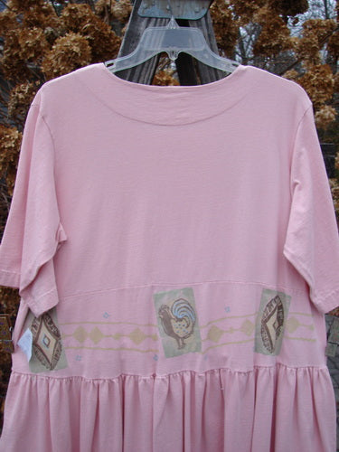 1999 NWT Garden Herb Dress Rooster Peony Size 1, featuring a rooster design, drop waistline with four-paneled pockets, ceramic top button, and a varying hemline with folds and flair.