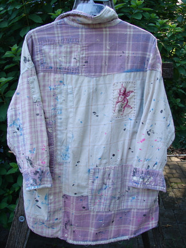 Magnolia Pearl Flannel Patched Surfside Shirt Sun Bleached OSFA showcases generous patchwork, hand distressing, long sleeves with button cuffs, and a unique rear patch, embodying vintage-inspired creativity and individuality from Bluefishfinder.com.