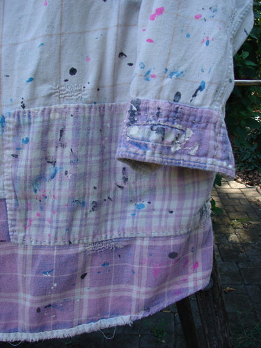 Close-up of the Magnolia Pearl Flannel Patched Surfside Shirt Sun Bleached OSFA, showcasing generous patching, hand distressing, button and snap closures, single breast pocket, and roughed-up edges.