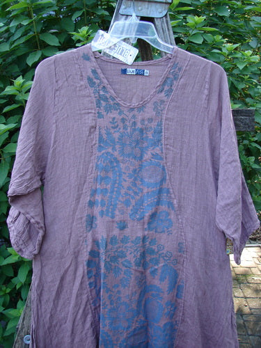 Barclay NWT Linen Venetian Dress Fern Field Tulsi Rose Size 0 displayed on a rack, showcasing its unique oval neckline, pinched three-quarter sleeves, and curvy panels, exemplifying Bluefishfinder.com's vintage style.