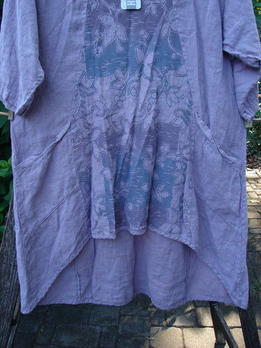 Barclay NWT Linen Posey Tunic Dress Orchid Field Sea Fog Size 0 features a floral pattern, oval neckline, flowy figure-eight shape, almost three-quarter sleeves, and two front pockets, embodying Bluefishfinder.com's vintage style.