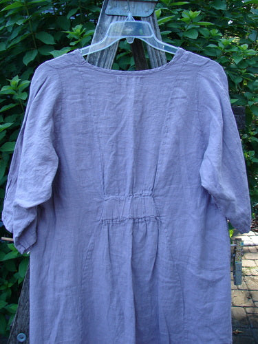 Barclay NWT Linen Posey Tunic Dress in Orchid Field Sea Fog Size 0, showcasing a flowy figure-eight shape with almost three-quarter sleeves, exterior drop pockets, and a distinctive oval neckline.