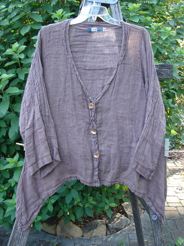 Barclay Linen Deep V Neck Three Button Top Unpainted Peat Size 0, featuring three-quarter pinched sleeves, a three-button front, and a varying dippy sided hemline, perfect for summer.