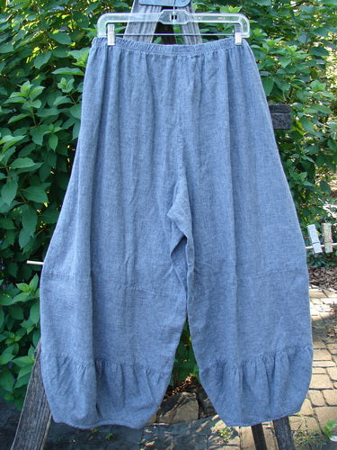 Barclay Hemp Cotton Meadow Pant Unpainted Indigo Stripe Size 1 hanging outdoors, displaying a full elastic waist, gathered horizontal panels, and slightly cropped length, embodying BlueFishFinder's vintage style and individuality.