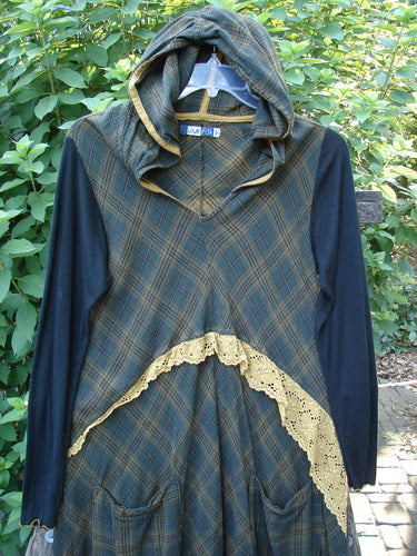 Barclay Rayon Linen Ruffle Pocket Dress in brown plaid, featuring a hi-low hemline, lace accents, and ribbed sleeves, embodying Bluefishfinder's vintage aesthetic and creative freedom for individual expression.