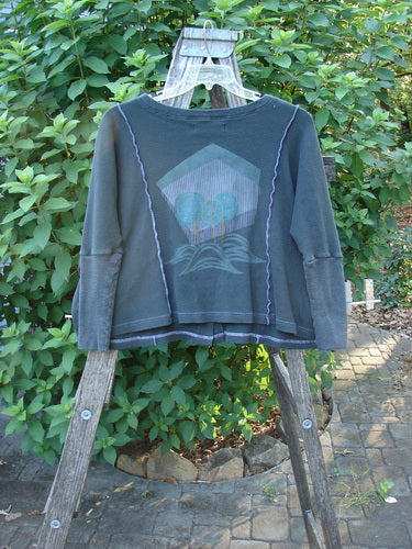 Barclay Thermal Exterior Stitch Two Pocket Jacket Geos Army Size 0 displayed outdoors, featuring long narrowing sleeves, a full button front, and double drop exterior painted pockets, embodying BlueFishFinder's vintage creative essence.